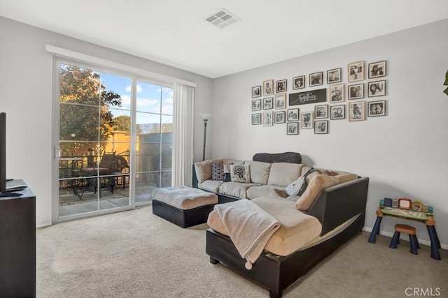 1440 Patricia Ave Unit 102, Simi Valley, CA 93065 - living room featuring carpet and baseboards