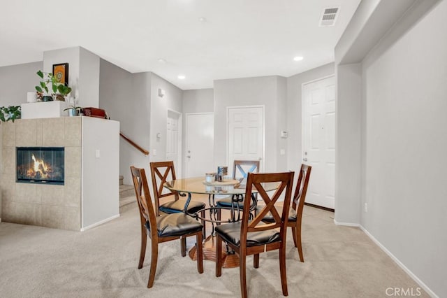 1440 Patricia Ave Unit 102, Simi Valley, CA 93065 - dining area featuring light carpet, baseboards, recessed lighting, and stairs