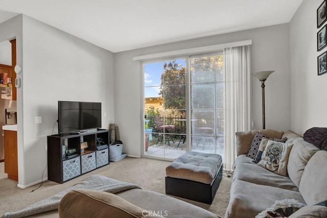 1440 Patricia Ave Unit 102, Simi Valley, CA 93065 - living room featuring carpet floors and baseboards