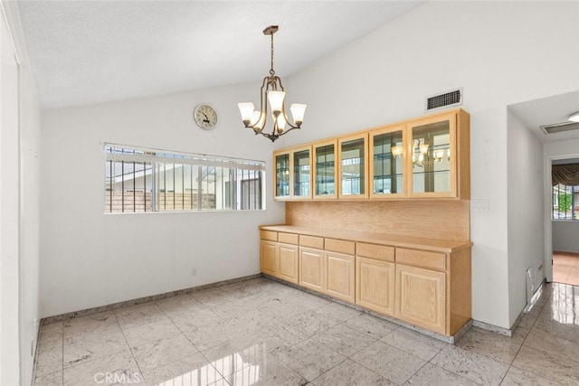 1425 Belleau Rd, Glendale, CA 91206 - unfurnished dining area featuring baseboards, high vaulted ceiling, and a chandelier