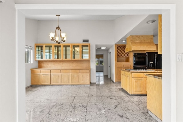 1425 Belleau Rd, Glendale, CA 91206 - kitchen featuring black appliances, a chandelier, light brown cabinetry, glass insert cabinets, and light marble finish flooring