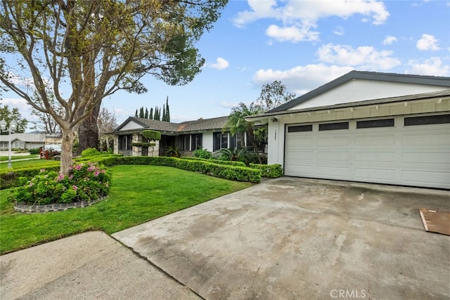 1425 Belleau Rd, Glendale, CA 91206 - ranch-style house with driveway, a front lawn, a garage, and stucco siding