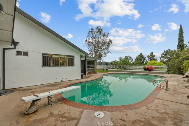 1425 Belleau Rd, Glendale, CA 91206 - view of swimming pool featuring a patio, a diving board, and fence