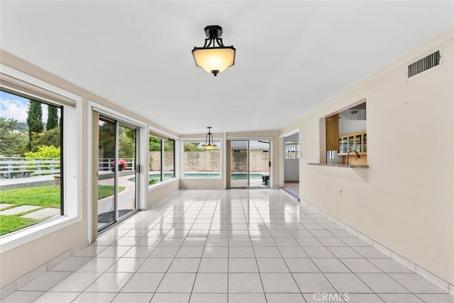 1425 Belleau Rd, Glendale, CA 91206 - unfurnished sunroom with tile patterned floors and a sink