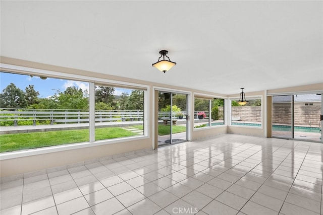 1425 Belleau Rd, Glendale, CA 91206 - unfurnished sunroom featuring healthy amount of natural light and tile patterned flooring