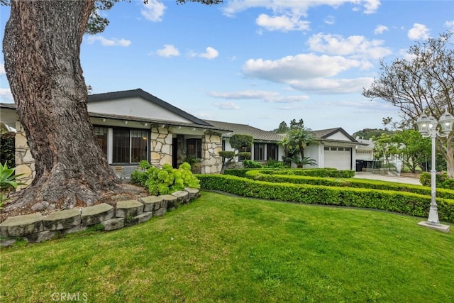 1425 Belleau Rd, Glendale, CA 91206 - ranch-style house featuring stone siding, a garage, a front yard, and driveway