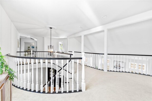 19365 Woodlands Dr, Huntington Beach, CA 92648 - hallway featuring an upstairs landing and carpet