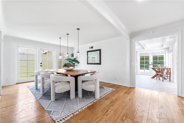 19365 Woodlands Dr, Huntington Beach, CA 92648 - dining space with light wood finished floors, ornamental molding, and baseboards