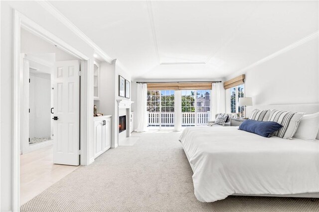 19365 Woodlands Dr, Huntington Beach, CA 92648 - bedroom with access to outside, a fireplace with flush hearth, and crown molding