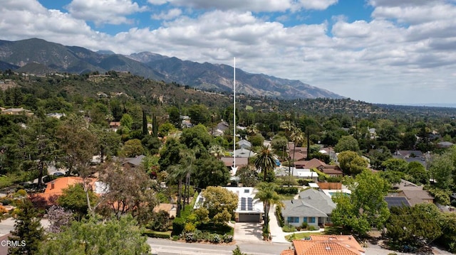 aerial view of residential area with mountains