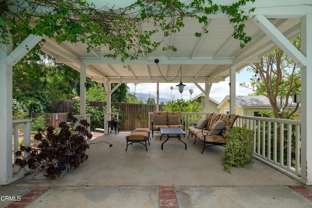 view of patio / terrace with fence and outdoor lounge area