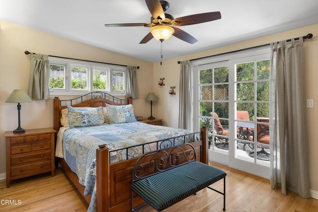bedroom featuring light wood-type flooring, ceiling fan, and baseboards