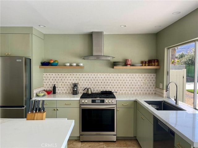 73180 Shadow Mountain Dr, Palm Desert, CA 92260 - kitchen with appliances with stainless steel finishes, wall chimney range hood, open shelves, a sink, and green cabinets