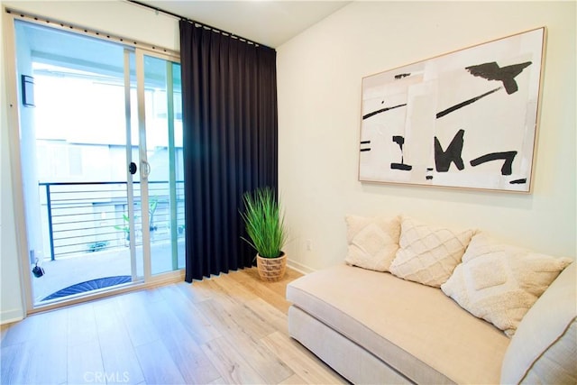 1567 Lima Way Unit 4, Placentia, CA 92870 - sitting room featuring wood finished floors and baseboards