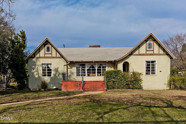 1065 Nithsdale Rd, Pasadena, CA 91105 - tudor home with a front lawn, a chimney, and stucco siding