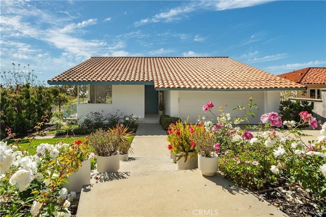 1737 Via Boronada, Palos Verdes Estates, CA 90274 - mediterranean / spanish-style home with a tiled roof, an attached garage, and stucco siding