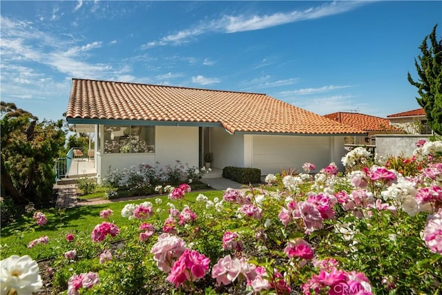 1737 Via Boronada, Palos Verdes Estates, CA 90274 - mediterranean / spanish-style house featuring a tiled roof, a garage, and stucco siding