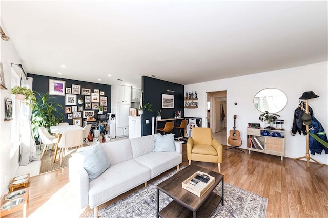 1850 W Greenleaf Ave Unit G, Anaheim, CA 92801 - living room with light wood-style flooring and recessed lighting