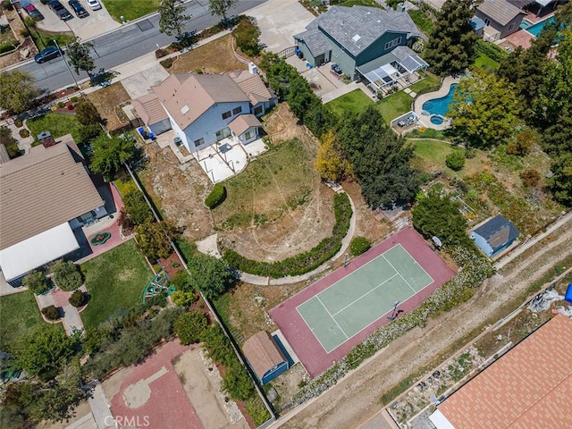 aerial view of property's location with nearby suburban area