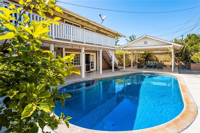 5642 Burlingame Ave, Buena Park, CA 90621 - view of pool featuring a gazebo, stairway, outdoor lounge area, a patio, and a deck
