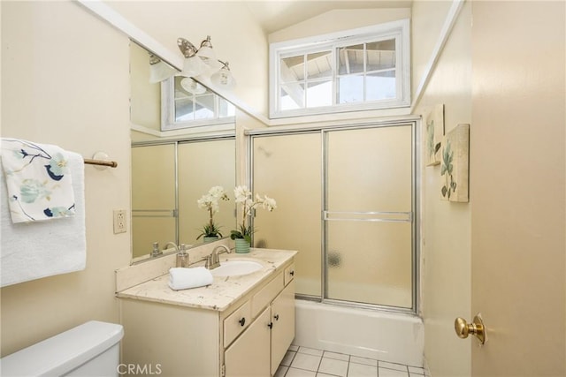 5642 Burlingame Ave, Buena Park, CA 90621 - bathroom with toilet, vanity, tile patterned floors, combined bath / shower with glass door, and vaulted ceiling