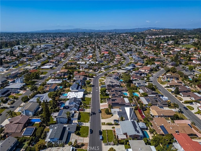 5642 Burlingame Ave, Buena Park, CA 90621 - aerial view of property and surrounding area featuring a mountainous background and nearby suburban area