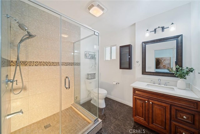 979 Ridgecrest St, Monterey Park, CA 91754 - bathroom featuring toilet, vanity, a shower stall, and baseboards