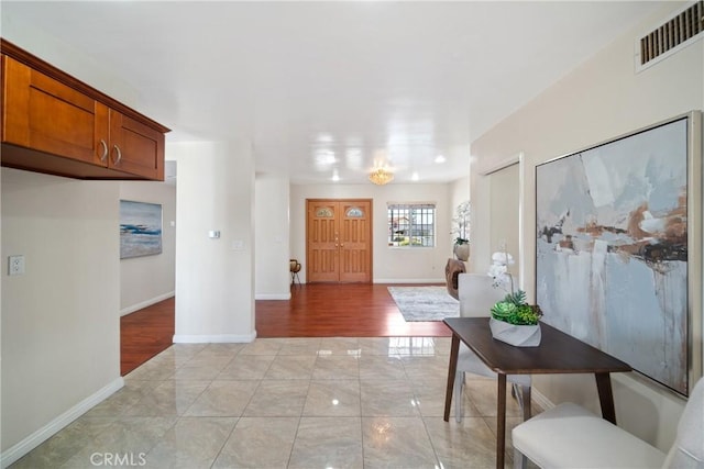 979 Ridgecrest St, Monterey Park, CA 91754 - entrance foyer featuring baseboards and light marble finish flooring