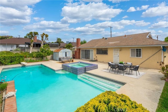 979 Ridgecrest St, Monterey Park, CA 91754 - view of pool with a patio area, a shed, an outdoor structure, fence, and a pool with connected hot tub