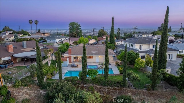 979 Ridgecrest St, Monterey Park, CA 91754 - aerial view at dusk of a residential view and view of pool
