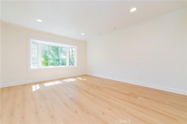 29355 Shell Cv, Laguna Niguel, CA 92677 - unfurnished room with crown molding, baseboards, light wood-type flooring, and recessed lighting