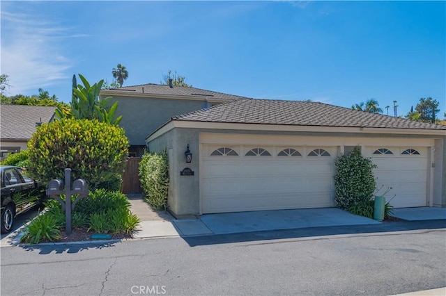 29355 Shell Cv, Laguna Niguel, CA 92677 - ranch-style house featuring stucco siding, an attached garage, and driveway