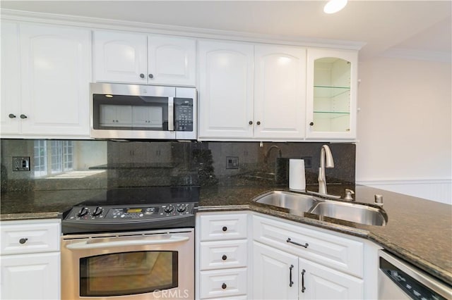 29355 Shell Cv, Laguna Niguel, CA 92677 - kitchen featuring stainless steel appliances, a sink, glass insert cabinets, and white cabinets
