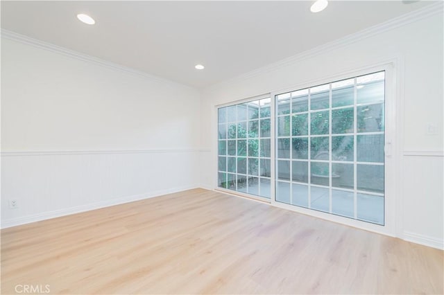 29355 Shell Cv, Laguna Niguel, CA 92677 - unfurnished room with wood finished floors, a wainscoted wall, crown molding, and recessed lighting