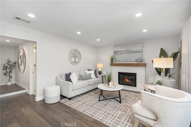 33028 Christina Dr, Dana Point, CA 92629 - living area featuring wood finished floors, a glass covered fireplace, and recessed lighting