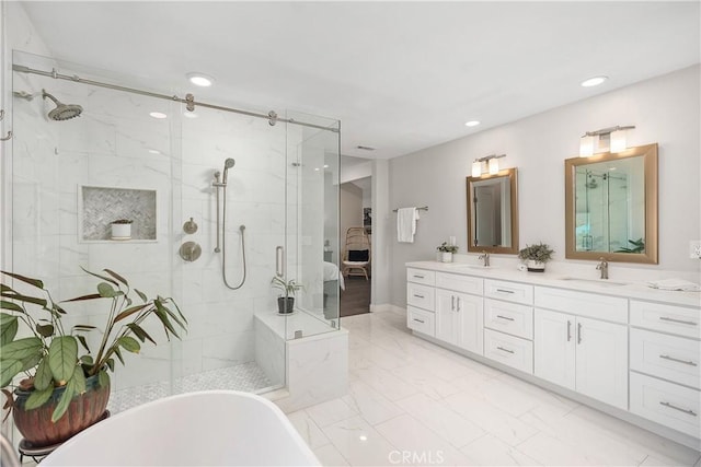 33028 Christina Dr, Dana Point, CA 92629 - full bath featuring a freestanding bath, marble finish floors, double vanity, a stall shower, and recessed lighting