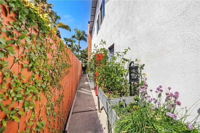 33028 Christina Dr, Dana Point, CA 92629 - view of side of property with stucco siding and fence