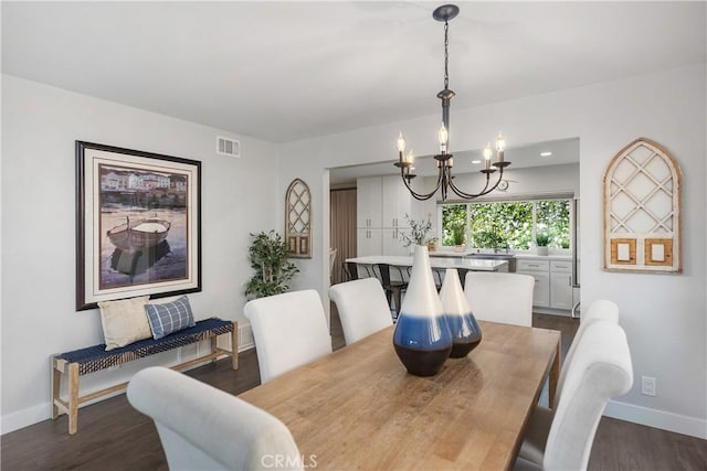 33028 Christina Dr, Dana Point, CA 92629 - dining space featuring a chandelier and dark wood finished floors