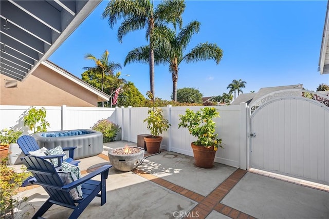 33028 Christina Dr, Dana Point, CA 92629 - view of patio / terrace with a fire pit and a gate