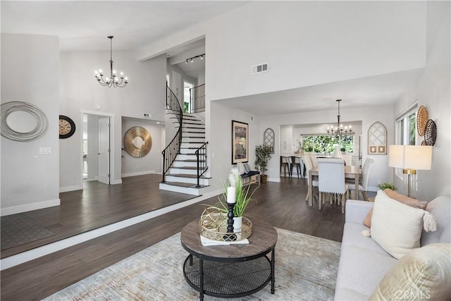 33028 Christina Dr, Dana Point, CA 92629 - living area with a chandelier, high vaulted ceiling, wood finished floors, and stairs