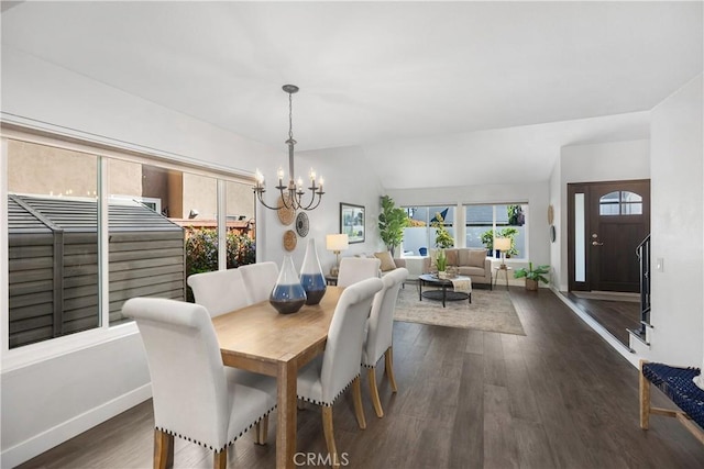 33028 Christina Dr, Dana Point, CA 92629 - dining space featuring a chandelier, dark wood-style floors, and lofted ceiling
