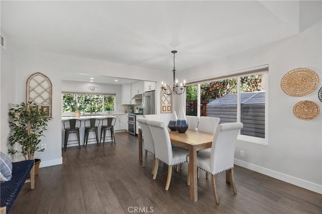 33028 Christina Dr, Dana Point, CA 92629 - dining space featuring a chandelier and dark wood-style flooring