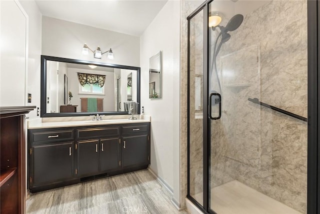 6680 Brook Way, Paradise, CA 95969 - full bath with a stall shower, vanity, and wood finished floors