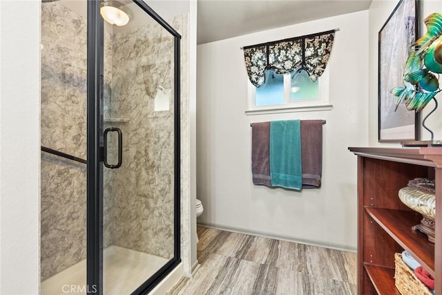6680 Brook Way, Paradise, CA 95969 - full bathroom with wood finished floors, a stall shower, and toilet