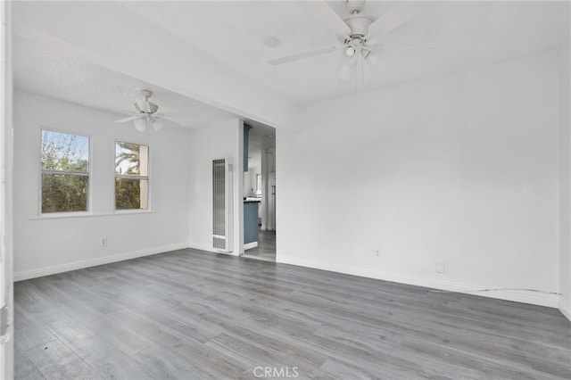 2580 Ganahl St, Los Angeles, CA 90033 - empty room featuring a heating unit, a ceiling fan, and baseboards