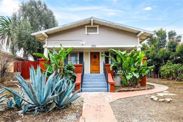 2580 Ganahl St, Los Angeles, CA 90033 - view of front of house featuring covered porch and fence
