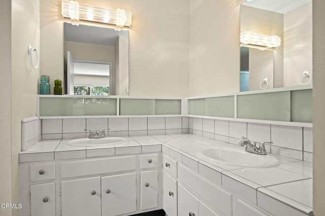 4232 De Paul St, Ventura, CA 93003 - bathroom featuring backsplash and double vanity