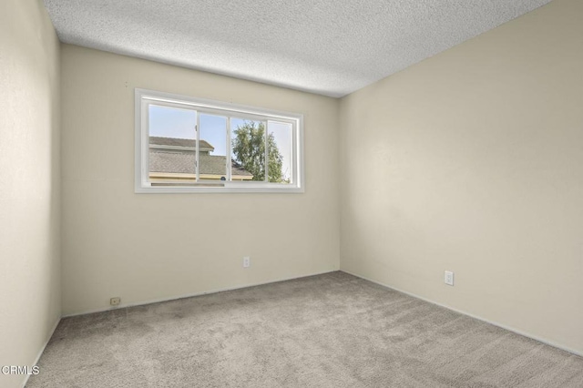 4232 De Paul St, Ventura, CA 93003 - carpeted empty room with a textured ceiling