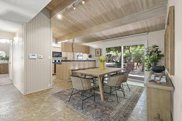 4232 De Paul St, Ventura, CA 93003 - dining space featuring track lighting and wooden ceiling with exposed beams