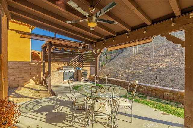 view of patio featuring outdoor dining area, a grill, and a fenced backyard